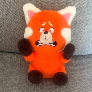 Orange and White Plush Toy